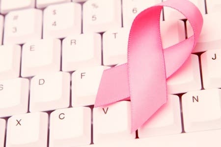 breast cancer ribbon on keyboard